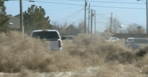 A truck attempts to plow through the tumbleweeds in Roswell, New Mexico